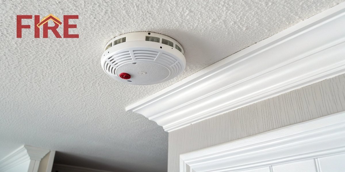 A smoke alarm on a ceiling, indicating a fire event